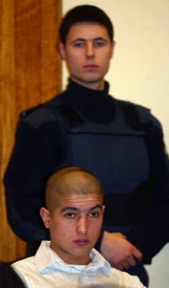 Loopt Mohamed Hammani (onder) over twee jaar weer vrij rond?