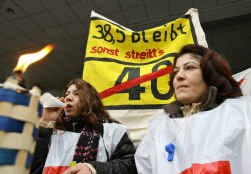 ,,38,5 (werkuren) blijft, anders staking''