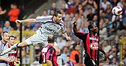Marcin Wasilewski buffelt tussen Christ Bruno (links) en Zanzan Atte-Oudeyi (rechts) de bal voorbij Patrick Nys.belga<br>