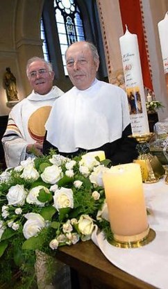 Deken Frans Verhelst en kerkbaljuw Albert Destoop werden gevierd in de dekenale kerk. David Stockman<br>