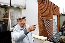 Gustave Noens ziet een verandamuur ingenomen door de bouwovertreding van zijn buurman. David Stockman<br>