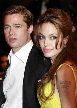 Babyfoto's tweeling Angelina Jolie verkocht