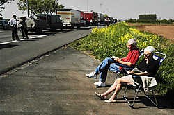 De snelweg: een wereld vol leven en rijkdom. Hier: leespauze tijdens een monsterfile op de E17.Eric De Mildt<br>