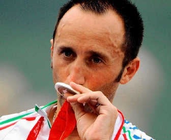 Davide Rebellin pakte in de olympische wegrit zilver op cera.epa
