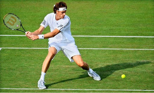 Dick Norman doet het nu ook uitstekend op het gras van Wimbledon.belga