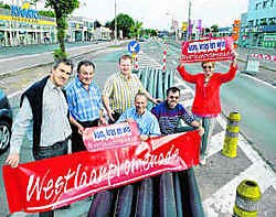 De handelaars willen met krasloten klanten lokken naar de Westlaan.Stefaan Beel