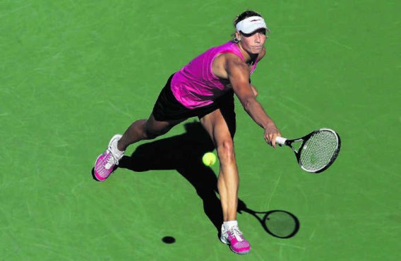 Een ijzeren discipline en wilskracht brachten Yanina Wickmayer naar de top vijftien. Maar de vraag rijst of het niet aangewezen is soms even de teugels te vieren.Nick Laham/afp