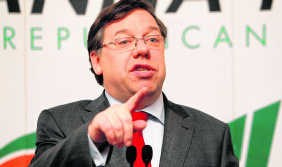 Premier Brian Cowan stapt op als partijleider. ap