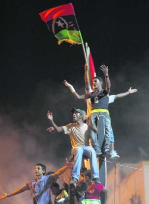 Vreugde in Benghazi bij het horen van de opstand in Tripoli. Alexandre Meneghini/ap