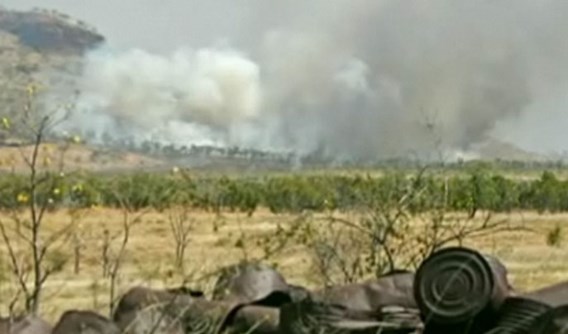 Australische lopers raken ingesloten door muur van vlammen