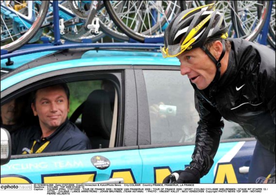 Johan Bruyneel met Lance Armstrong in de Tour 2009. 