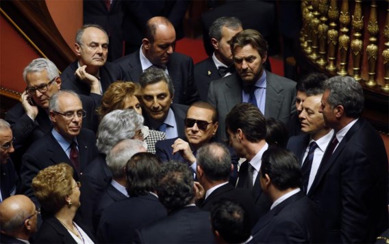 In de rechtszaak tegen de Italiaanse ex-premier Silvio Berlusconi (midden), op de foto in maart in de Senaat, kan het Hof van Cassatie nog alle kanten op.