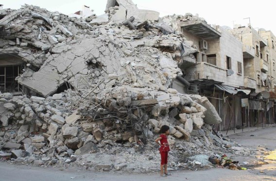 In Genève wordt onderhandeld, in Syrië blijft het leger van Assad bombarderen. Foto: de noordelijke stad Ariha, nabij Idlib.