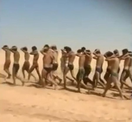 Een videobeeld van gevangen genomen Syrische soldaten die door IS zouden zijn geëxecuteerd. 