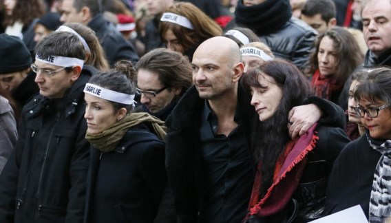 Advocaat Richard Malka (m.) op de republikeinse mars in Parijs na de aanslag op ‘Charlie Hebdo’. Hij verdedigt nu DSK op zijn proces. 