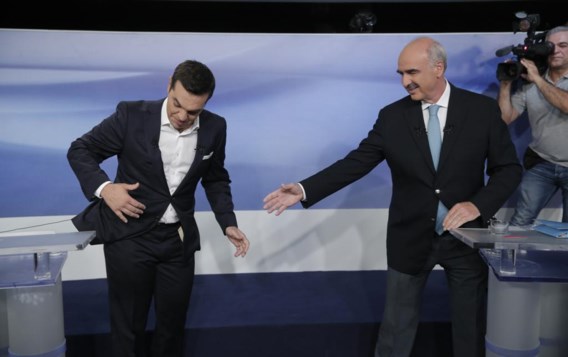 Alexis Tsipras, leider van Syriza (links), en zijn uitdager Evangelos-Vasileios Meimarakis, van Nieuwe Democratie, na een tv-debat. 