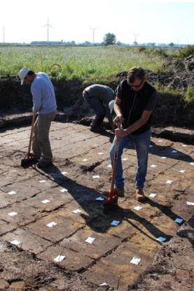 De archeologen aan het werk.
