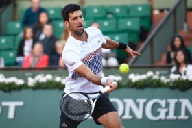 Nadal en Djokovic stomen door naar laatste acht in Parijs, Gasquet geeft op