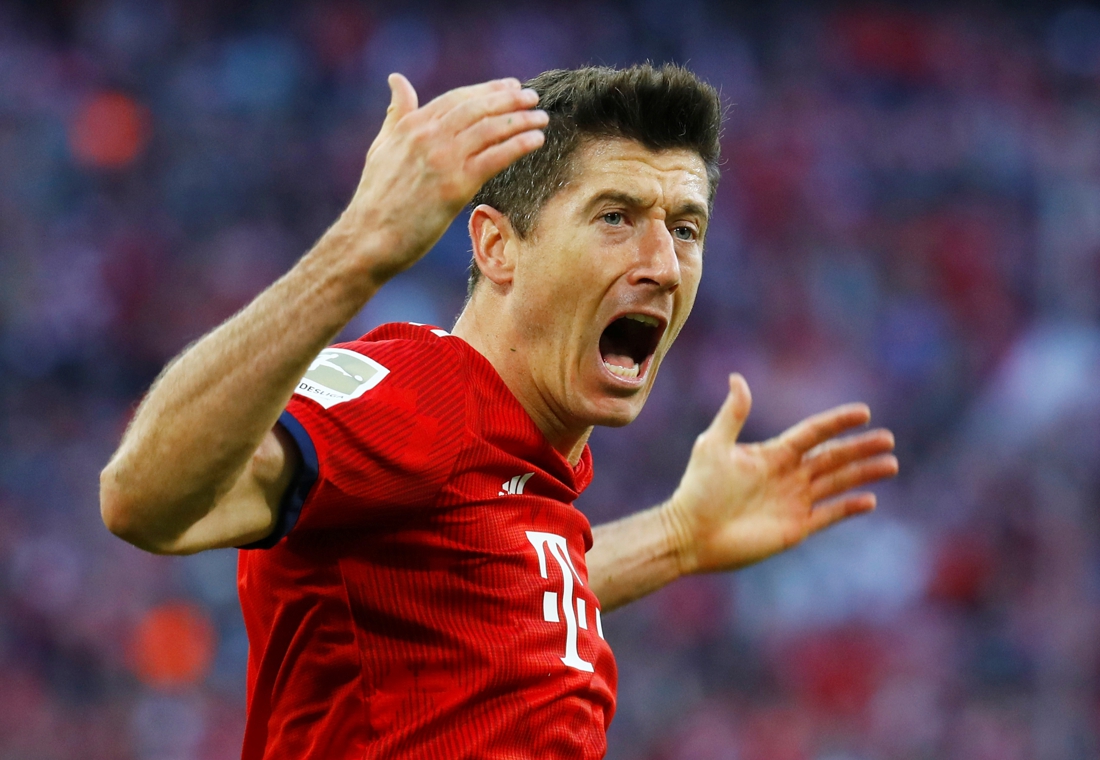 Bayern-spelers Robert Lewandowski en Kingsley Coman raken ...