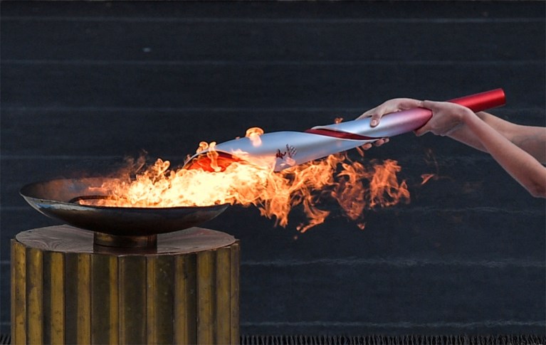 Olympisch vuur aangekomen in China onder kritiek