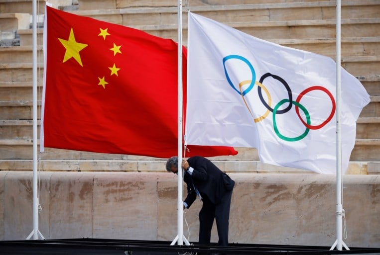 Olympisch vuur aangekomen in China onder kritiek