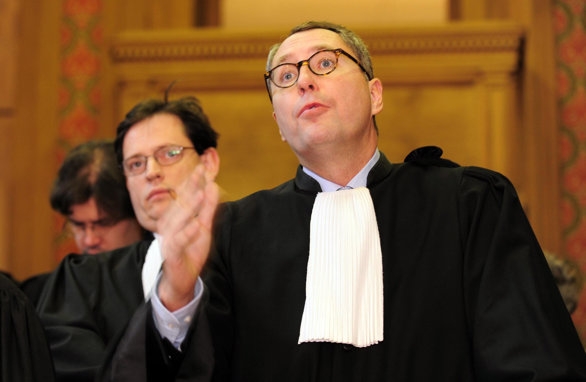 Modrikamen eist 7 miljard van de staat en BNP Paribas  