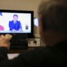 President Emmanuel Macron in een talkshow op de Franse tv. 