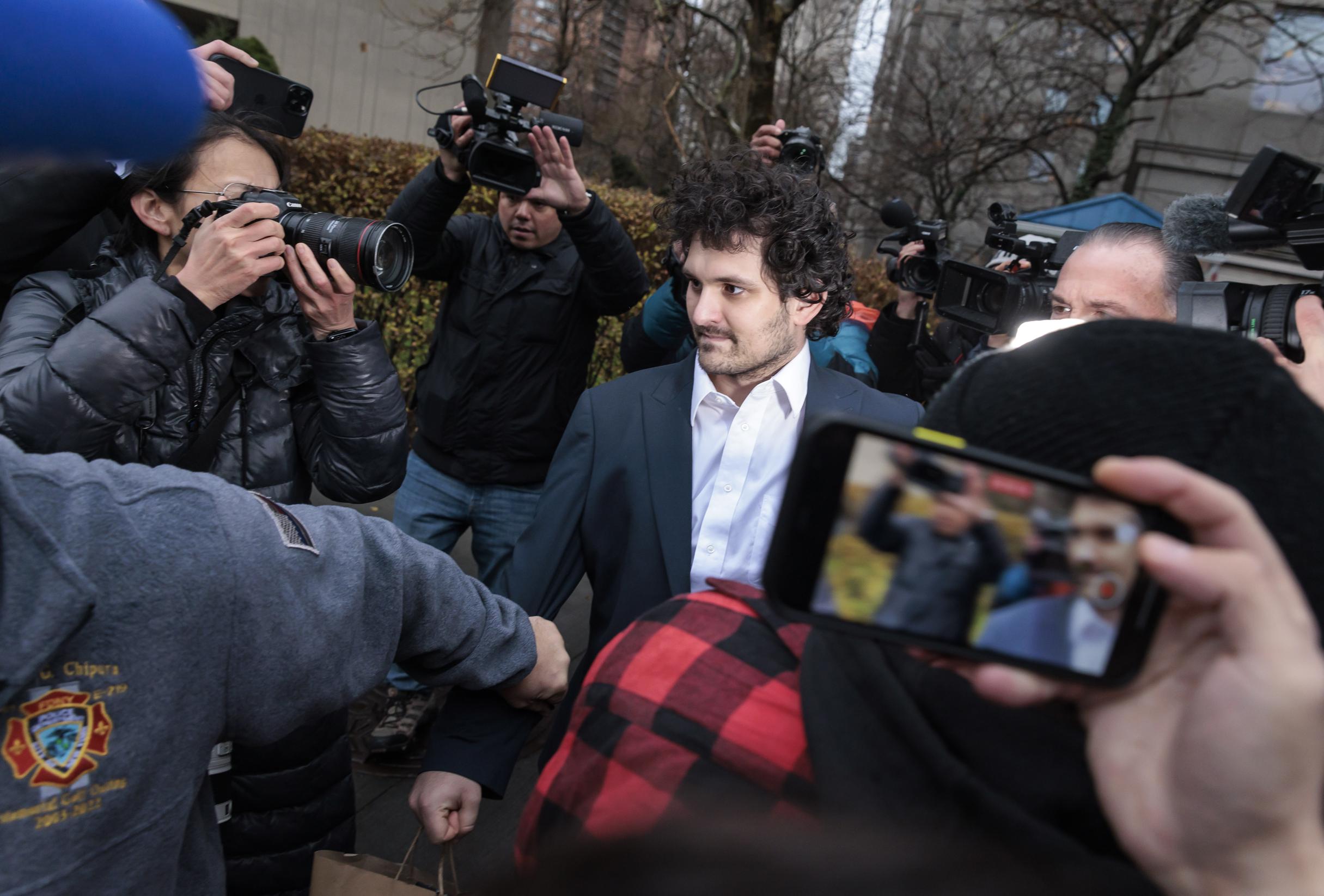 Fallen cryptocurrency king faces 115 years in prison, but pleads not guilty